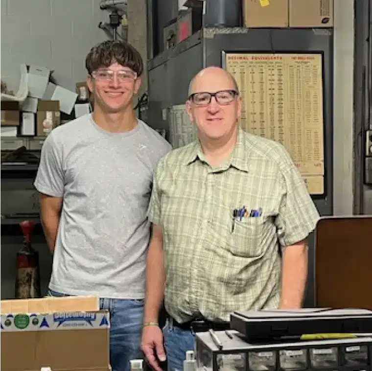FRANTZ team members in the manufacturing facility representing investment in the next generation